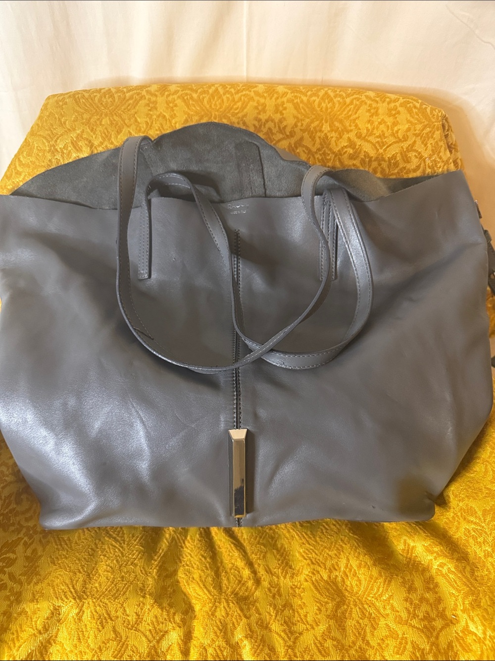 Raoul Gray Leather Tote with Metal Pendant